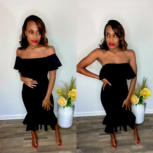 Forever Galore wearing a black off the shoulder ruffle dress with Shoe Dazzle clear heels great for date night or brunch or girls night out 